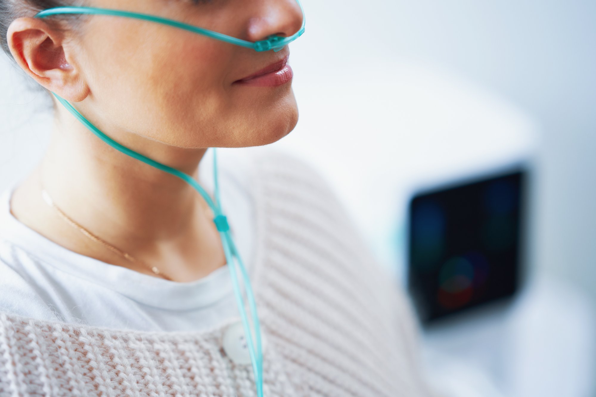 Patient breathing molecular hydrogen through a nasal cannula during a hydrogen inhalation session in Katonah, NY